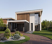 Новый дом без отделки у реки