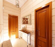 Дом из бруса в лесу у озера