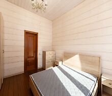 Дом из бруса в лесу у озера