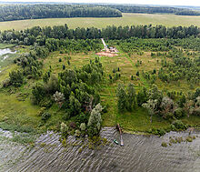 Участок в первой линии от воды