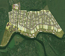 Участок на берегу реки в Монави